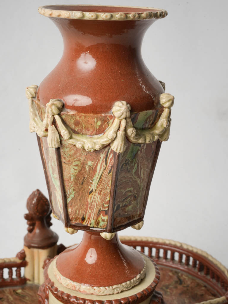 Finely detailed mascaron urn  