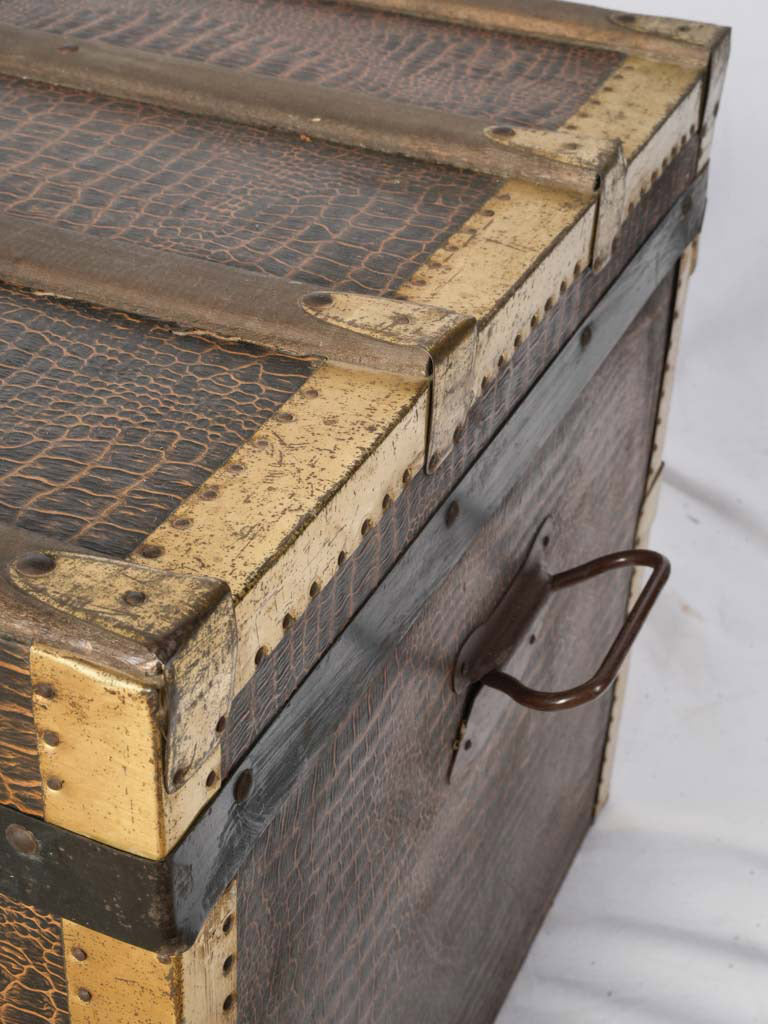 Rugged checked-paper lined travel trunk  