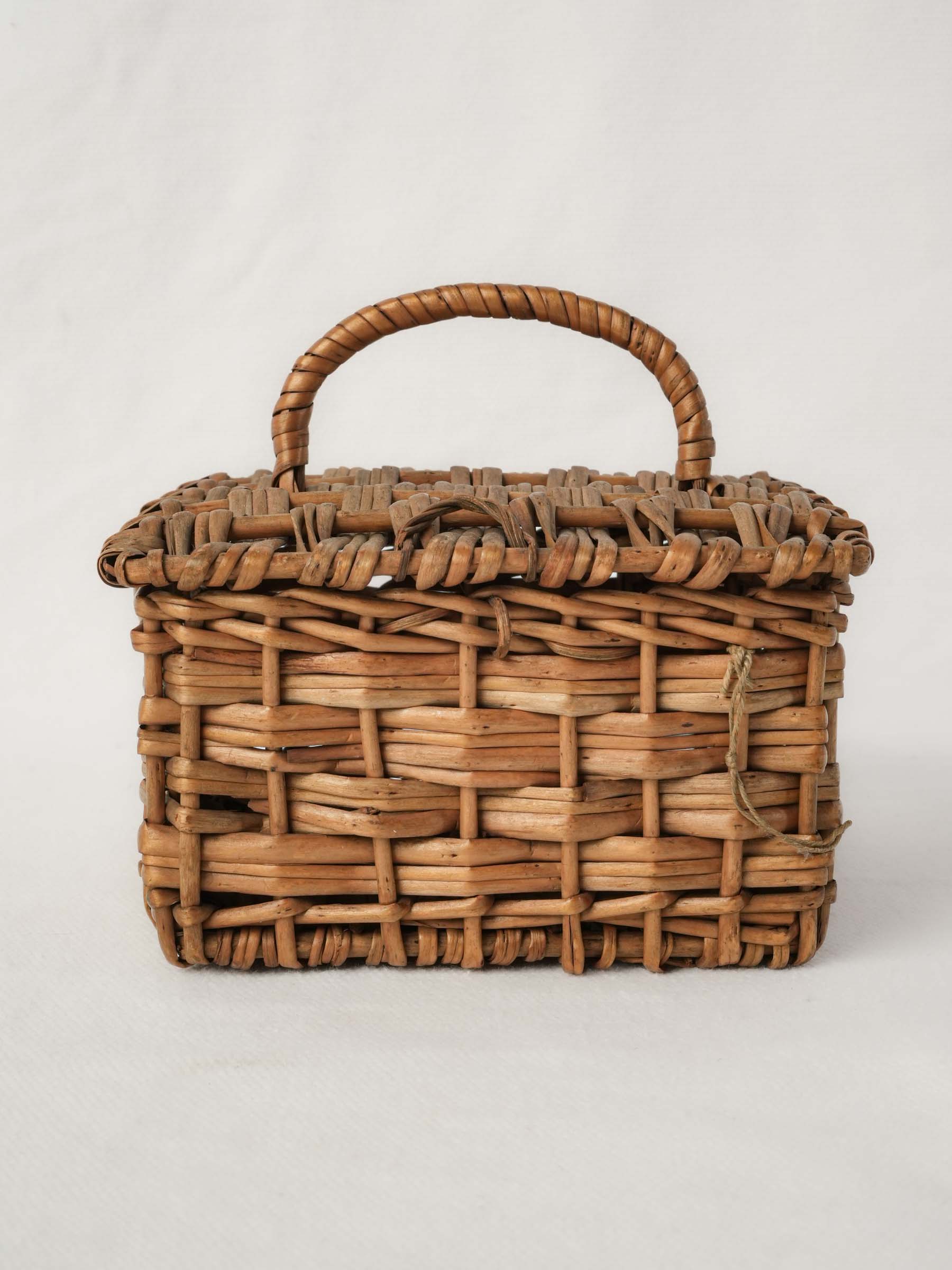 Small vintage wicker trinket box