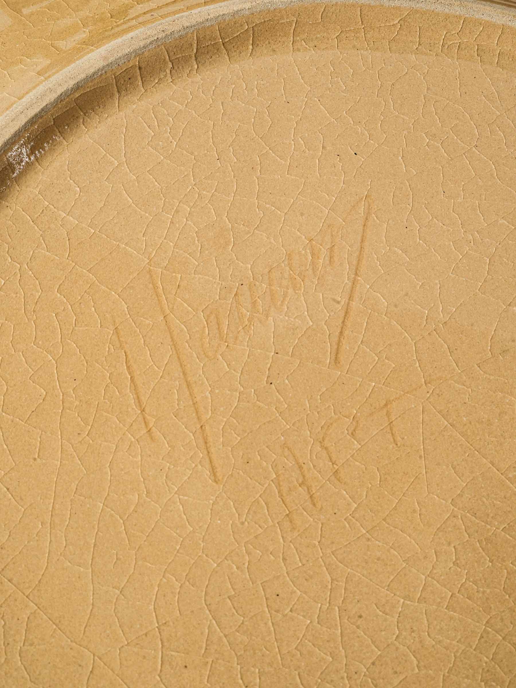Set of ten ocher dinner plates