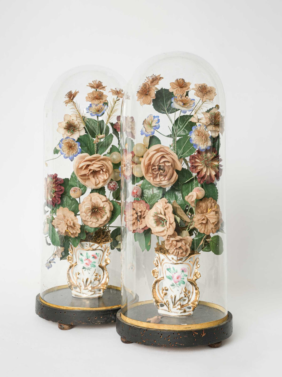 Pair of 1930s Old Paris porcelain bridal vases w/ floral paper bouquets in glass domes 19"