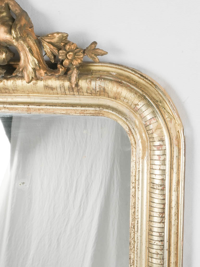 Opulent floral-detail antique overmantle mirror