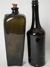 Elegant, green antique glass bottles