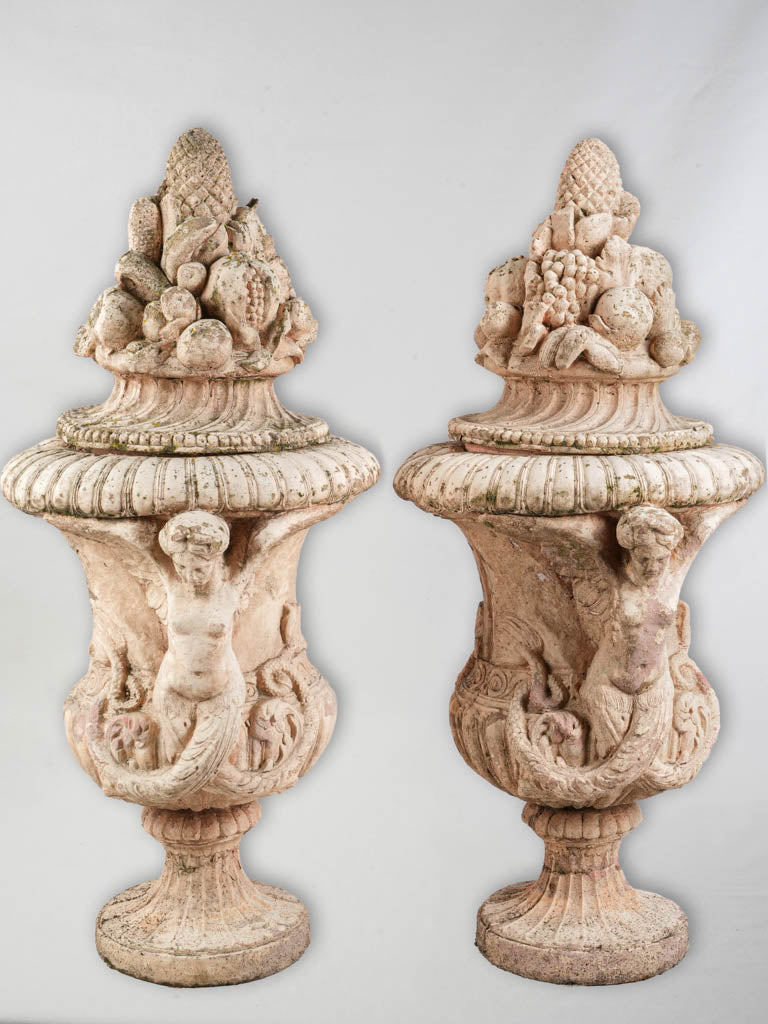 Vintage ornate terracotta lidded urns
