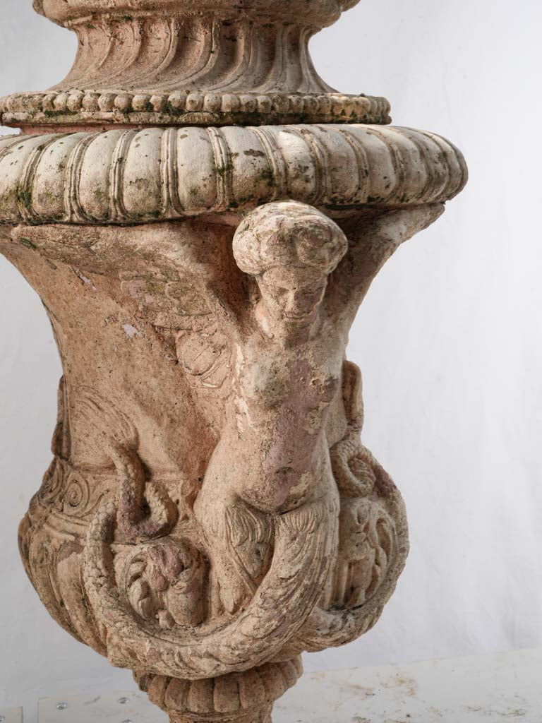Softly weathered patina terracotta urns