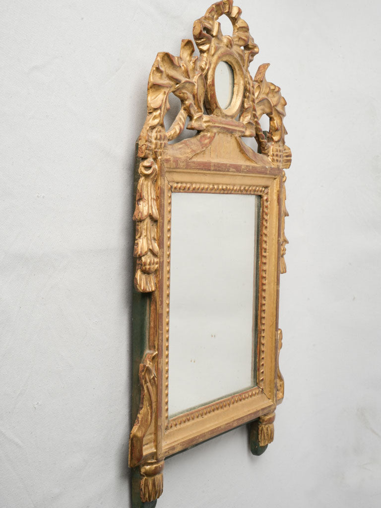 Richly gilded rectangular wall mirror