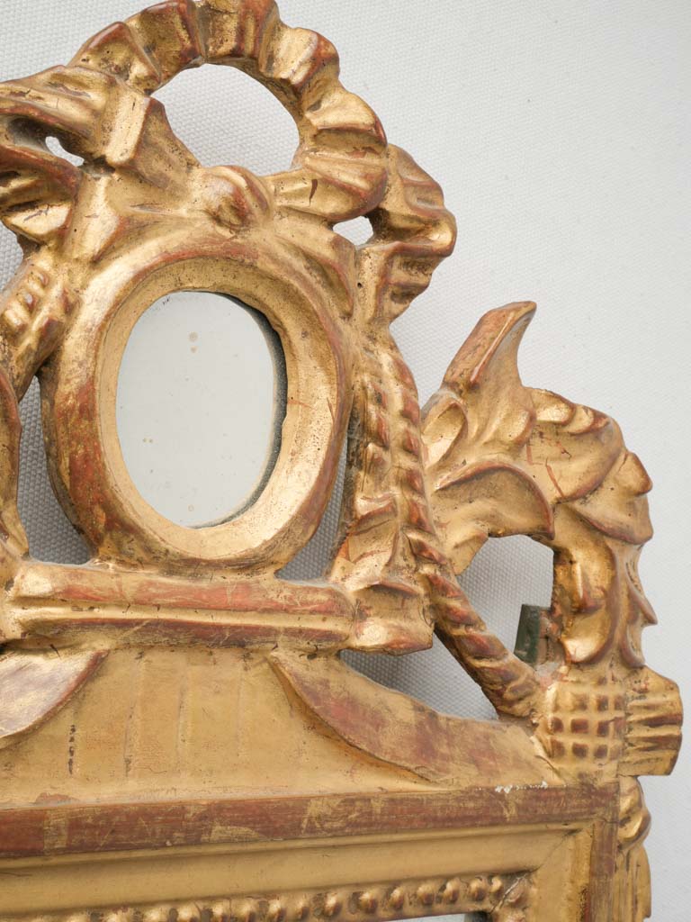 Neoclassical style ribbon crest mirror