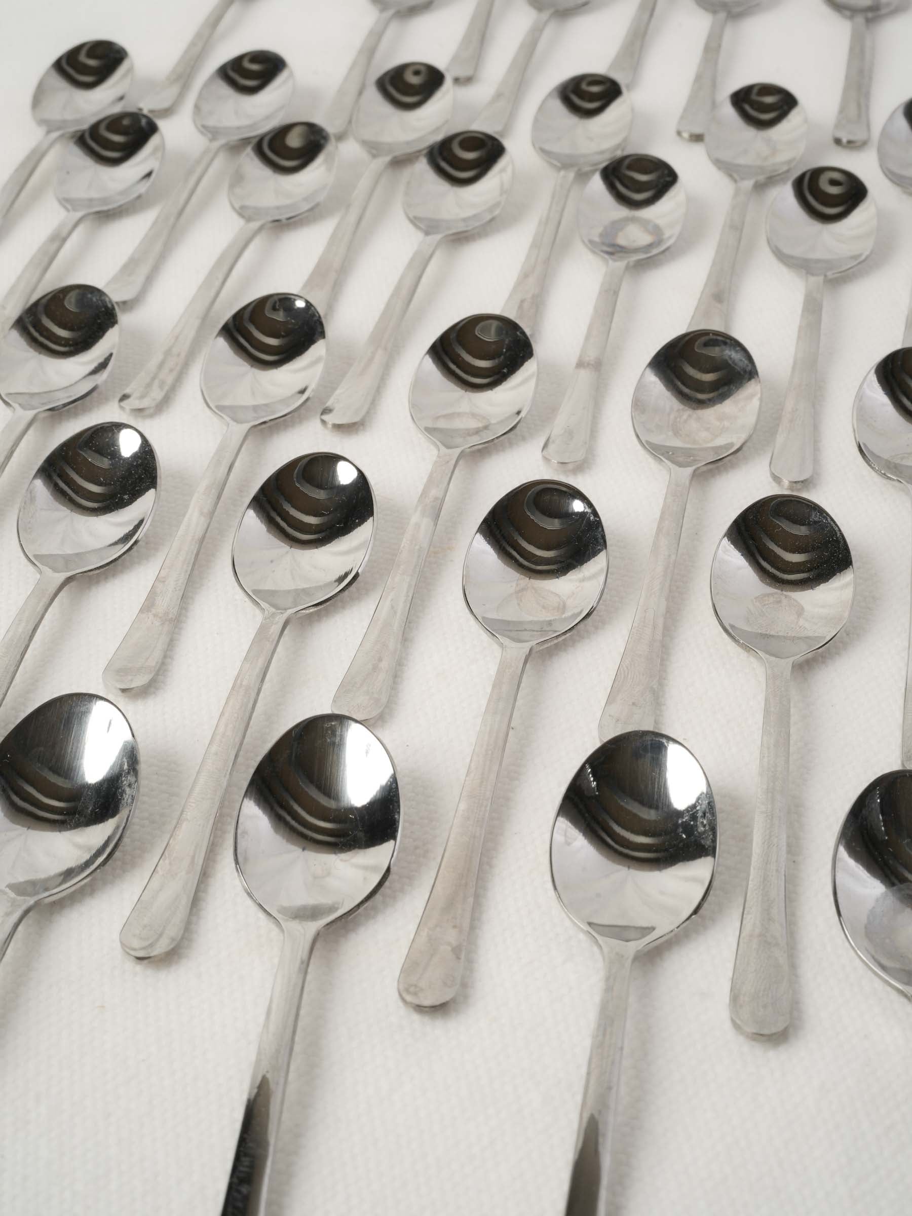 Collection of stainless steel tasting spoons