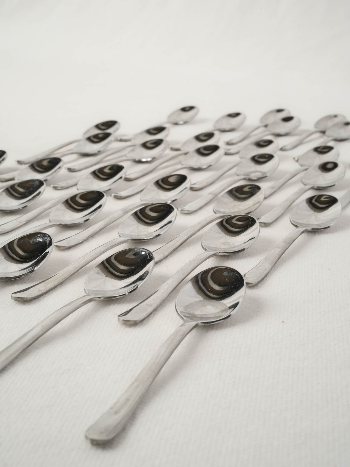 Collection of stainless steel tasting spoons