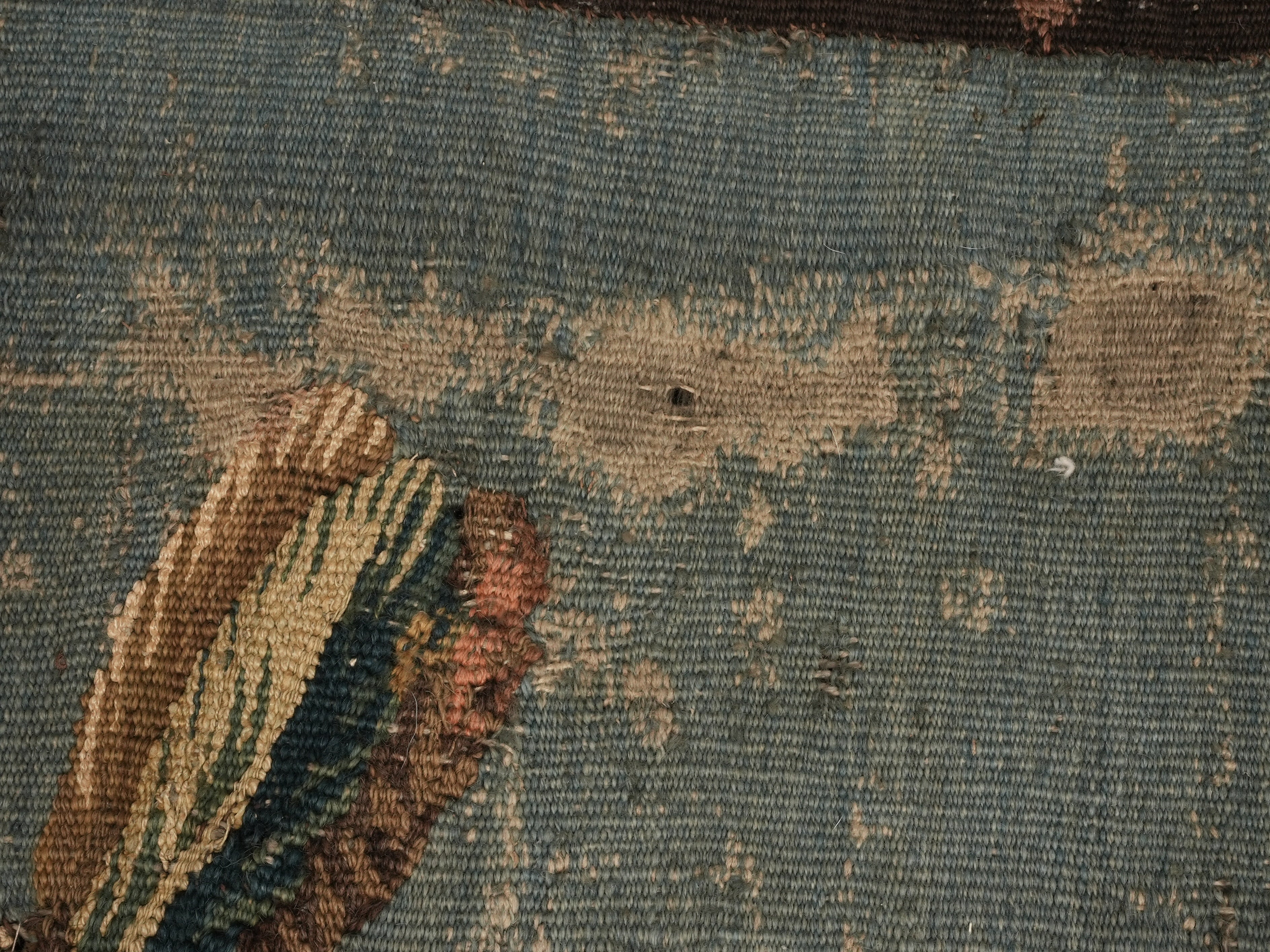 Aged Aubusson with floral elements