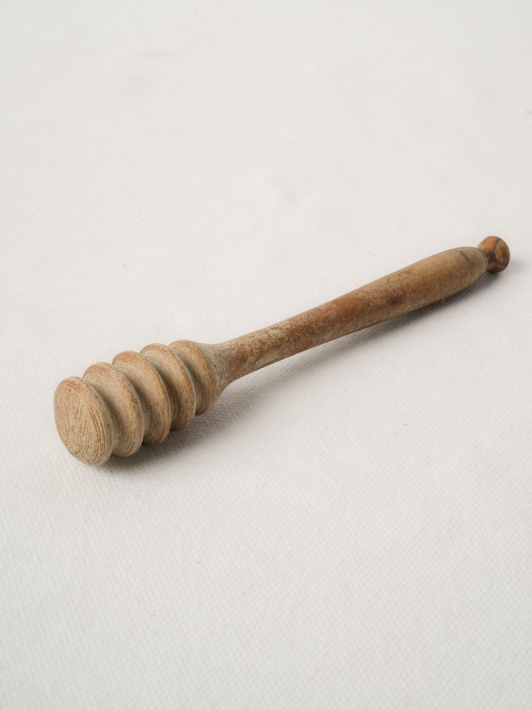 Vintage wooden honey dipper