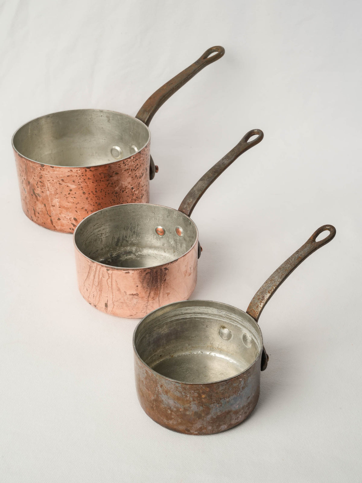 Set of 3 vintage copper saucepans