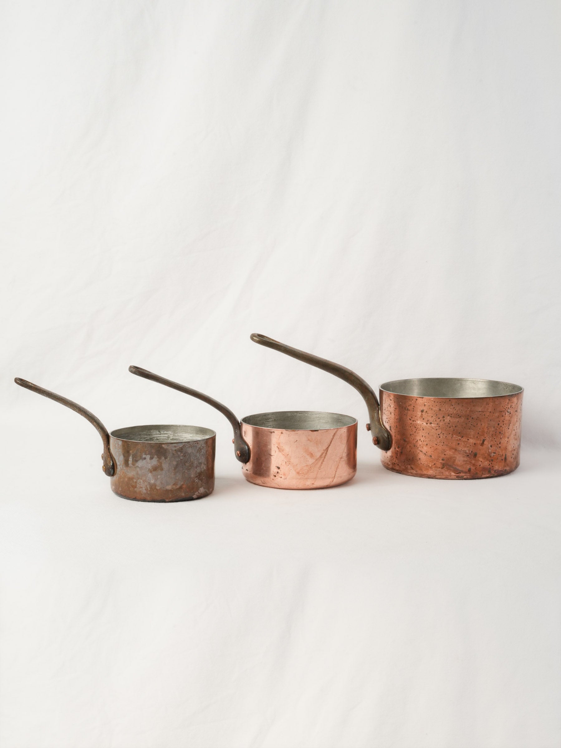 Set of 3 vintage copper saucepans