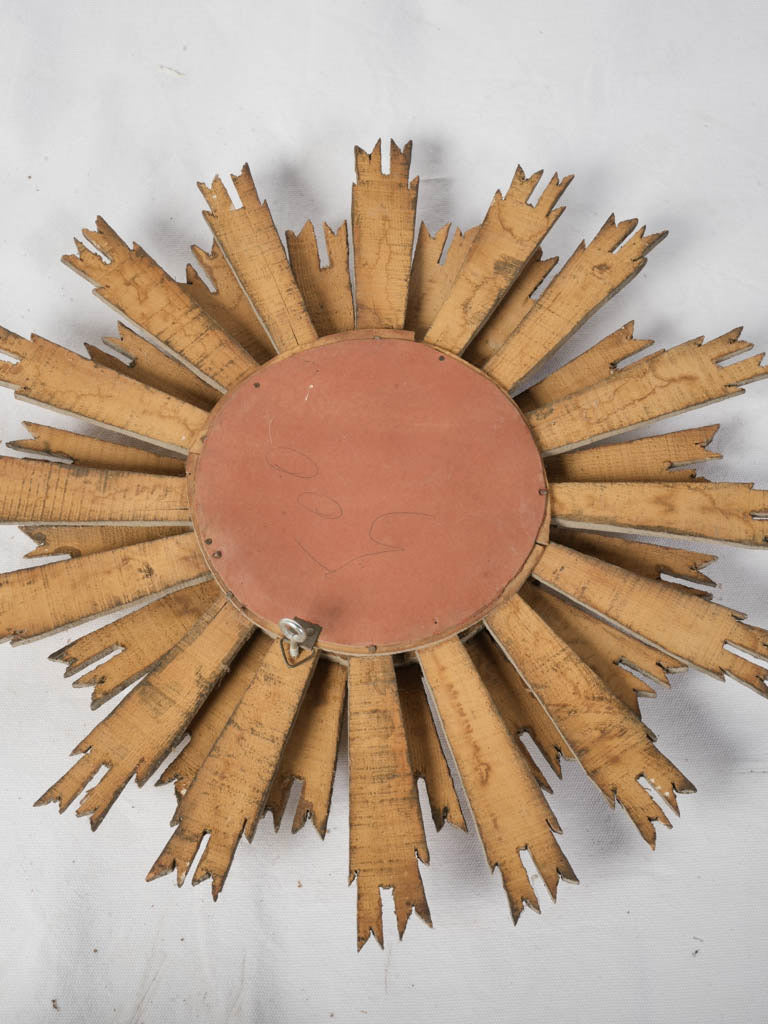 Elegant sculptural sunburst mirror  