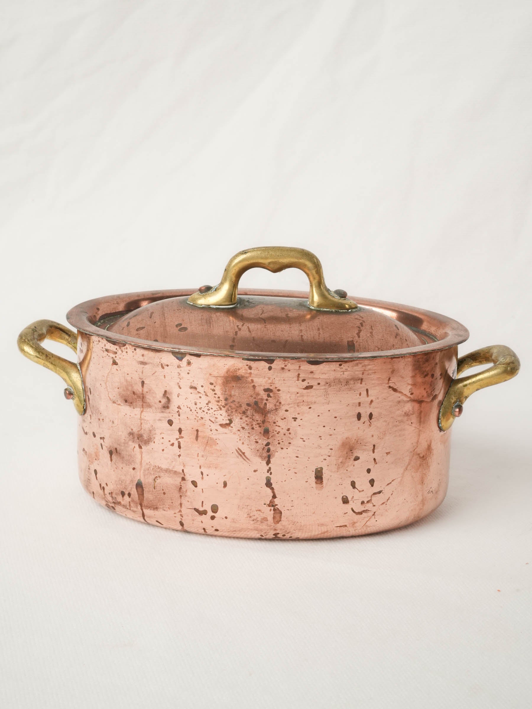 Set of four Copper Lidded Casseroles with Fish Kettle