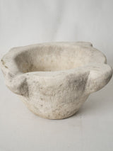 Time-worn antique white marble bowl