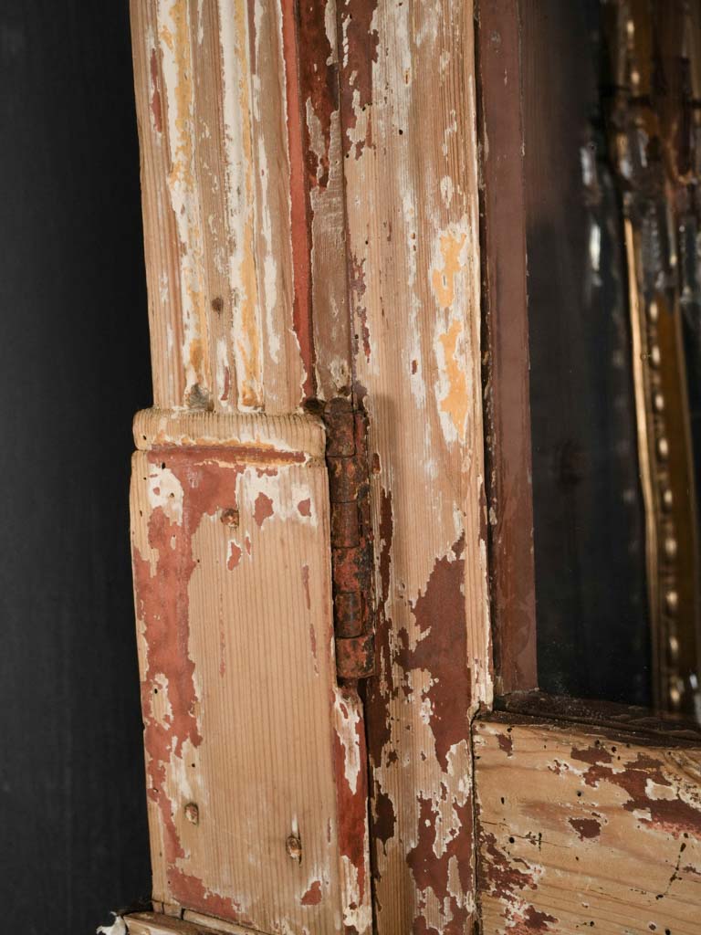 Warm-hued antique French glass cabinet  