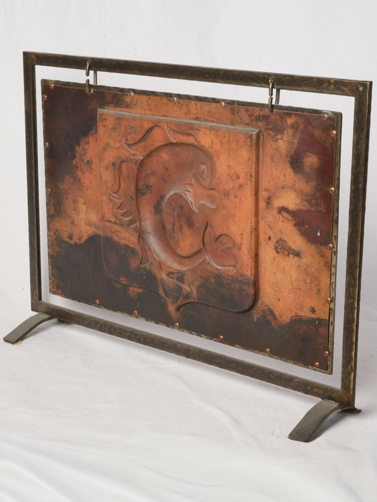 Heraldic motif fireplace panel  