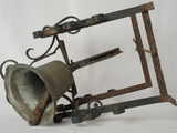 Ornate wrought iron wall bracket bell