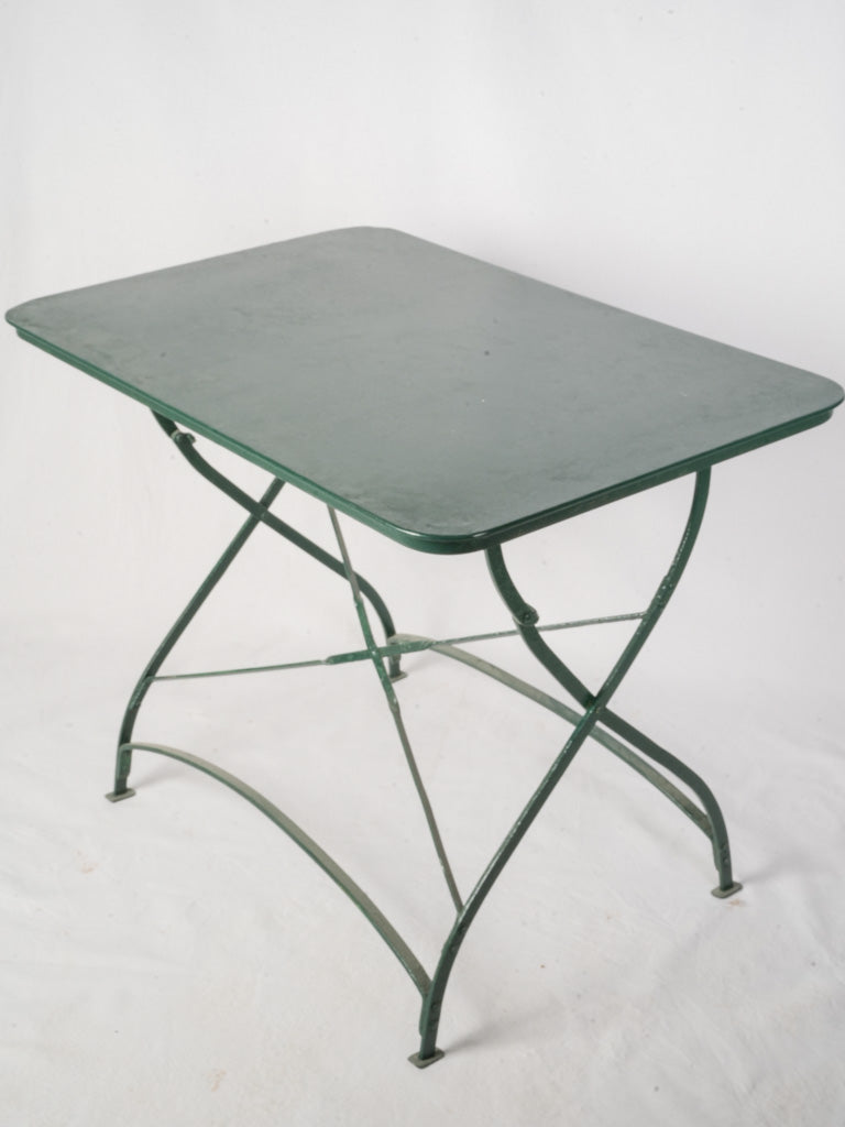 Graceful antique iron folding table  