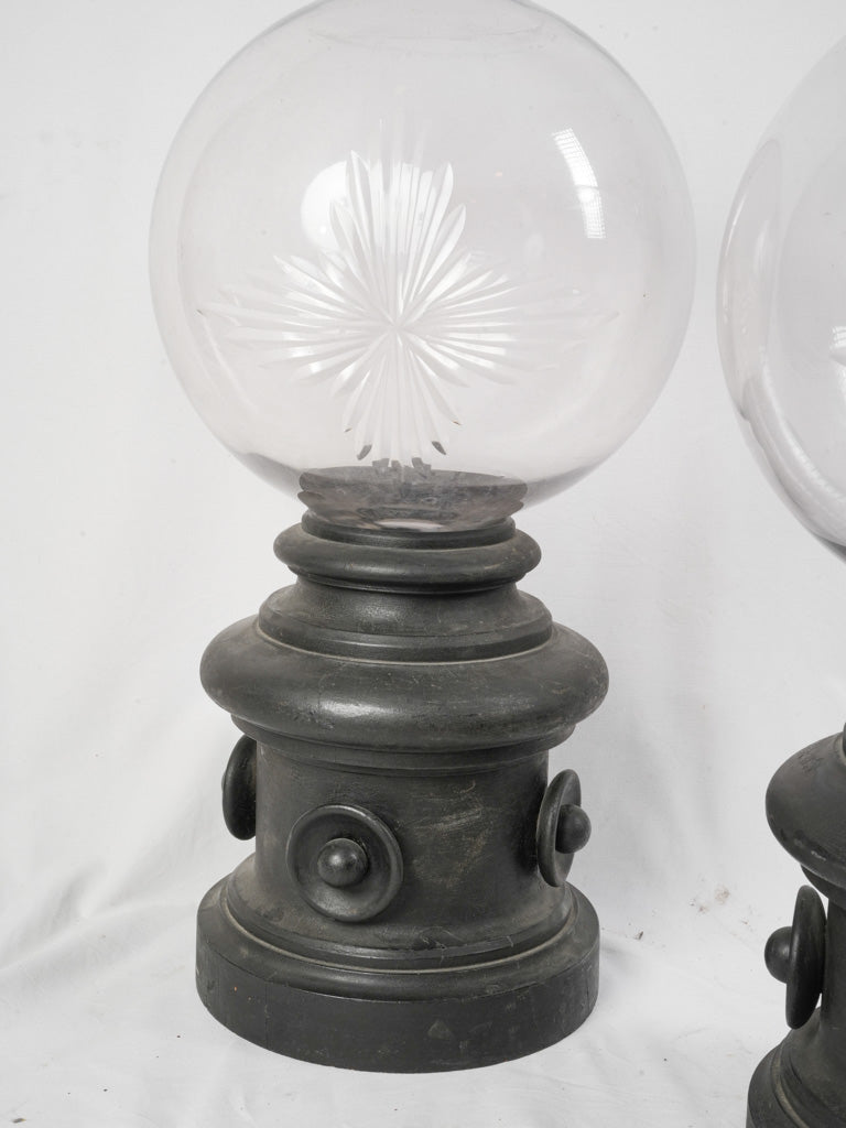 Tiered ebonized pedestal globes