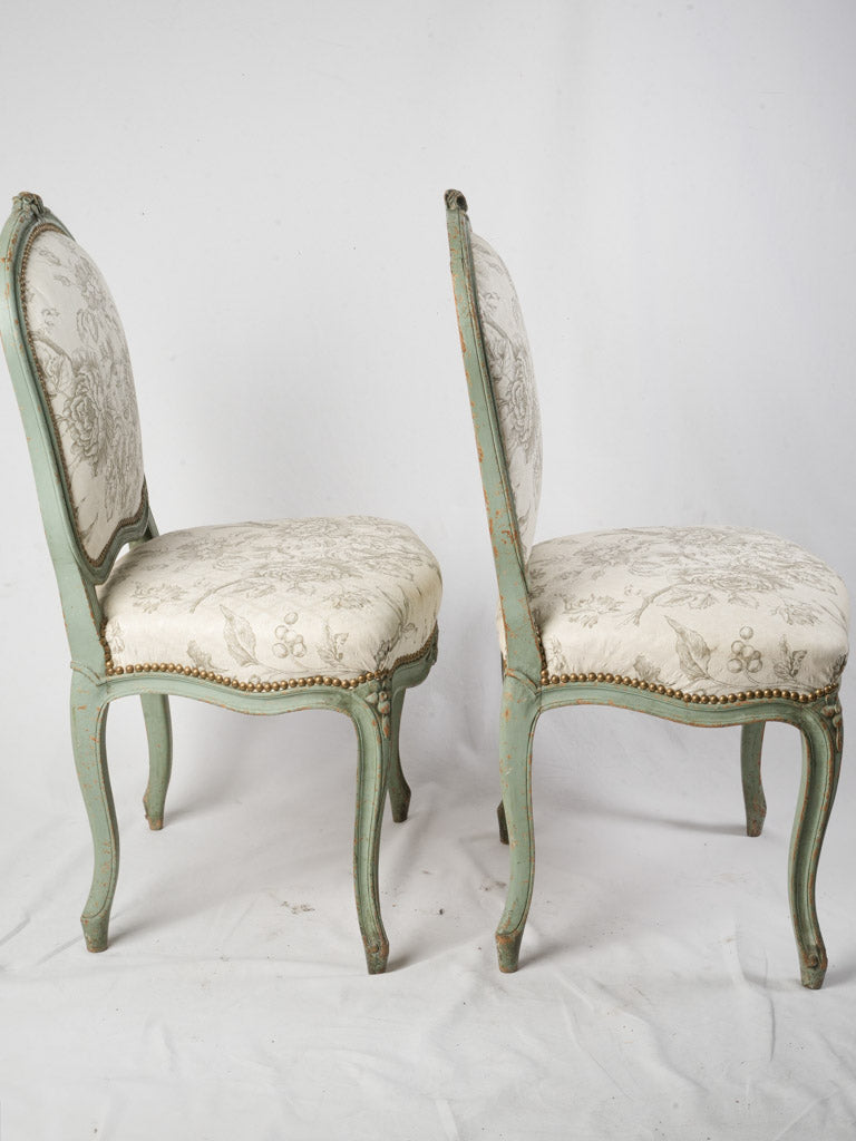 Decorative sage green painted chairs  