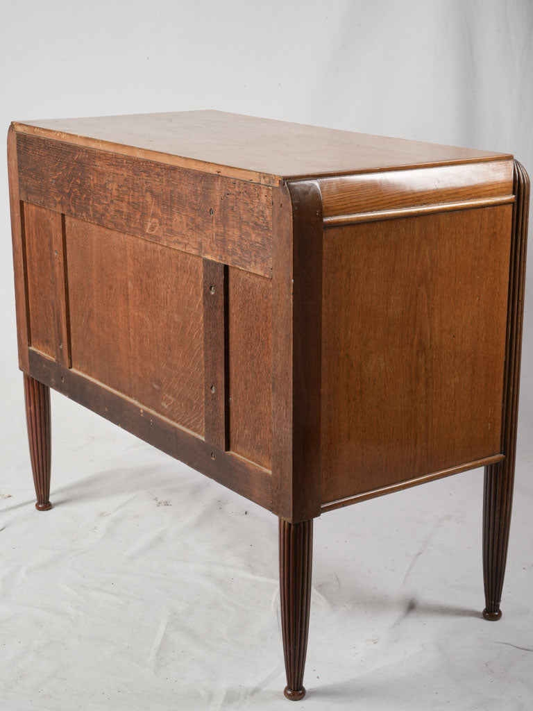 Distinctive brass-accented cabinet  