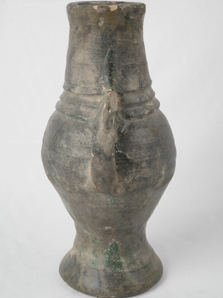 Worn Moroccan terra cotta vase