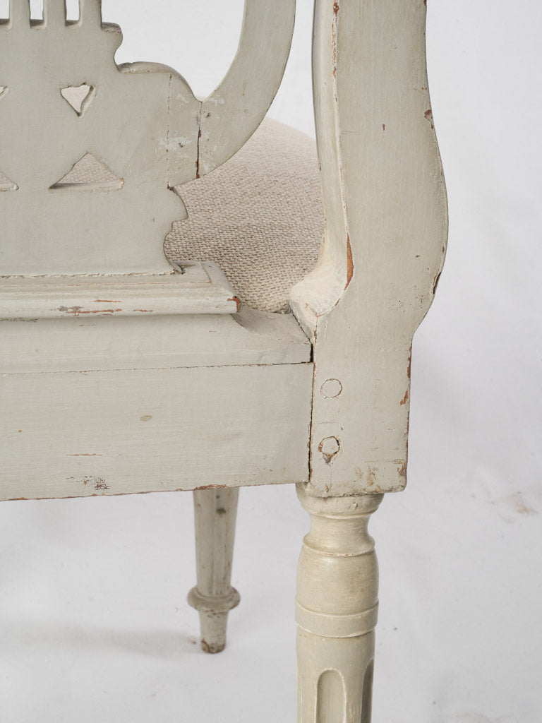 Character-filled carved lyre chair  