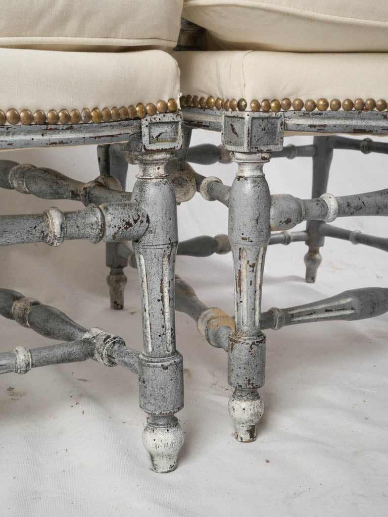 Historical boxed stretcher armchairs