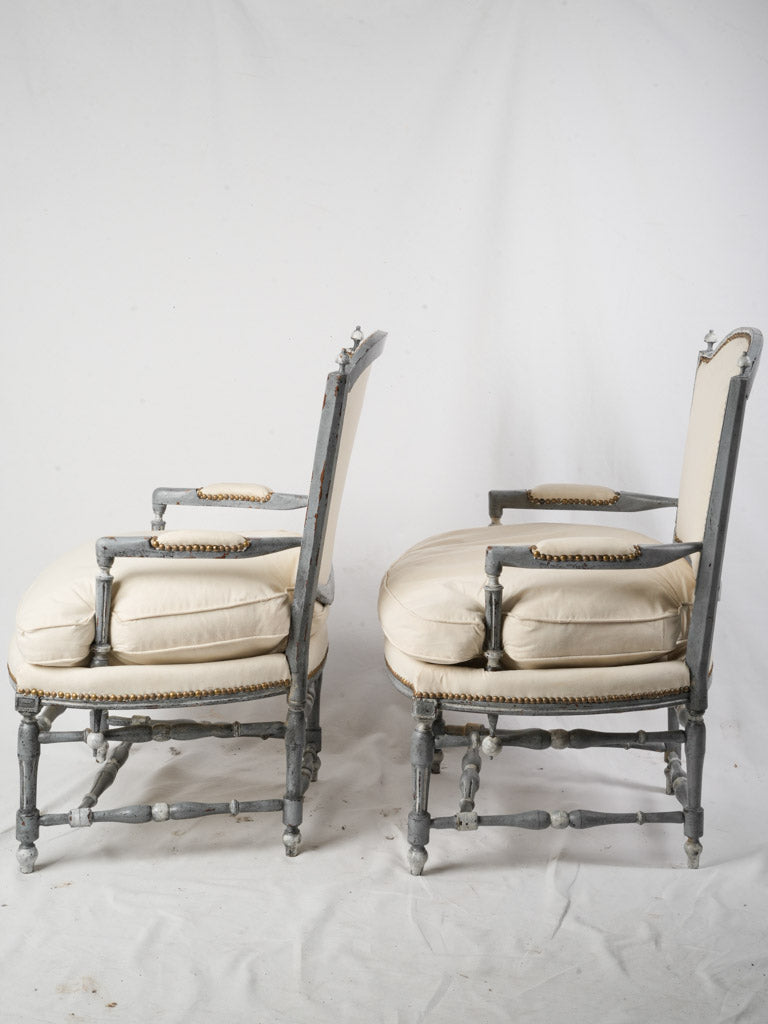Elegant arched-back fauteuils