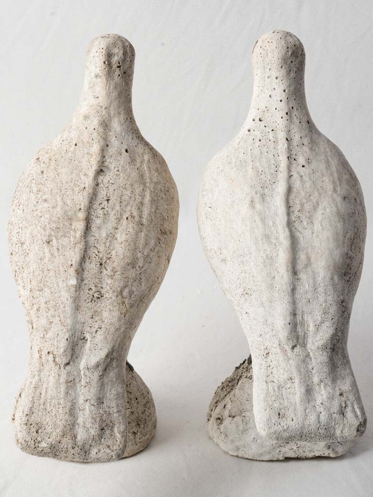 Graceful understated cement pigeon pair  