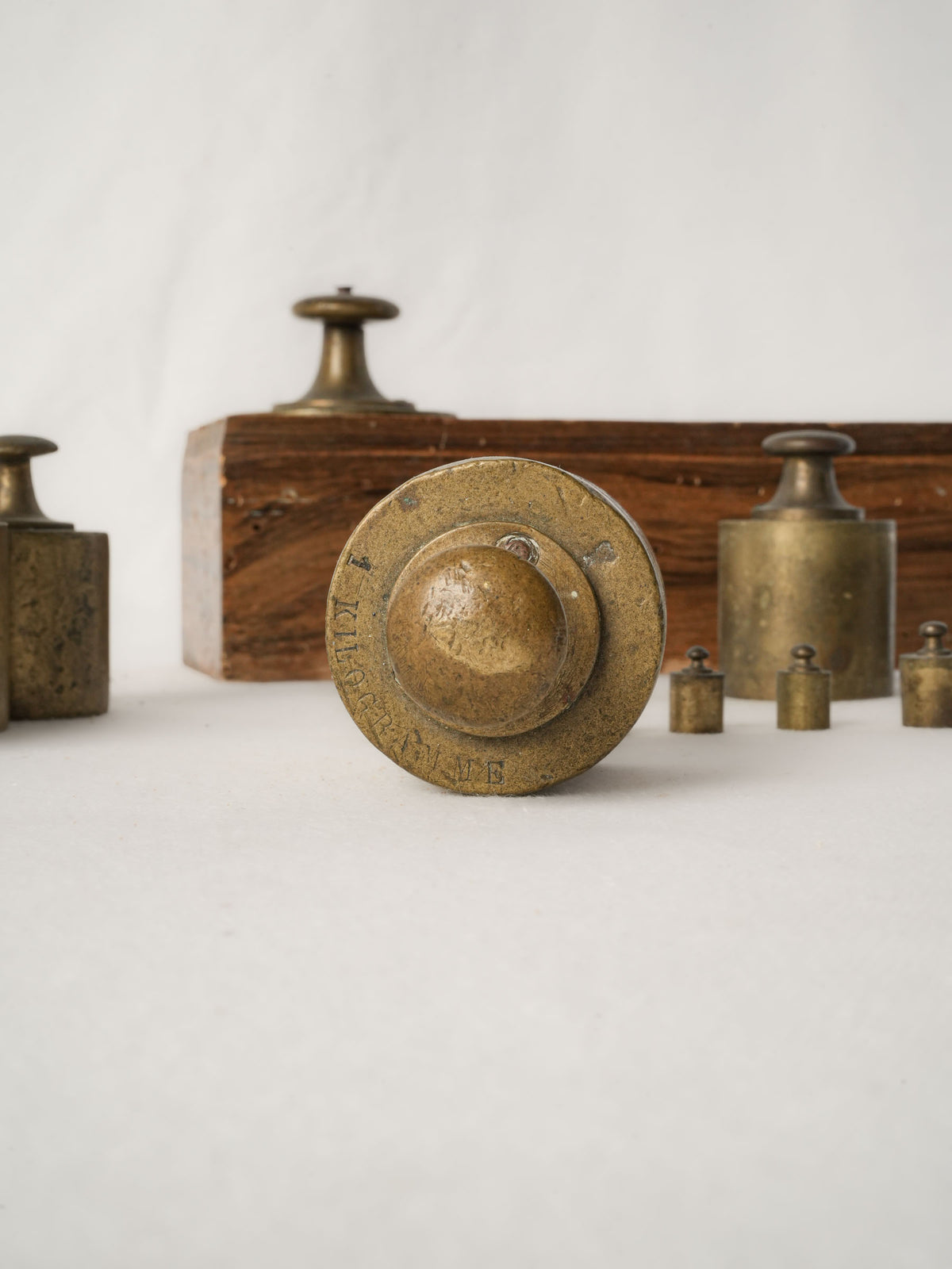 Antique French Brass Weights Set in Wooden Block