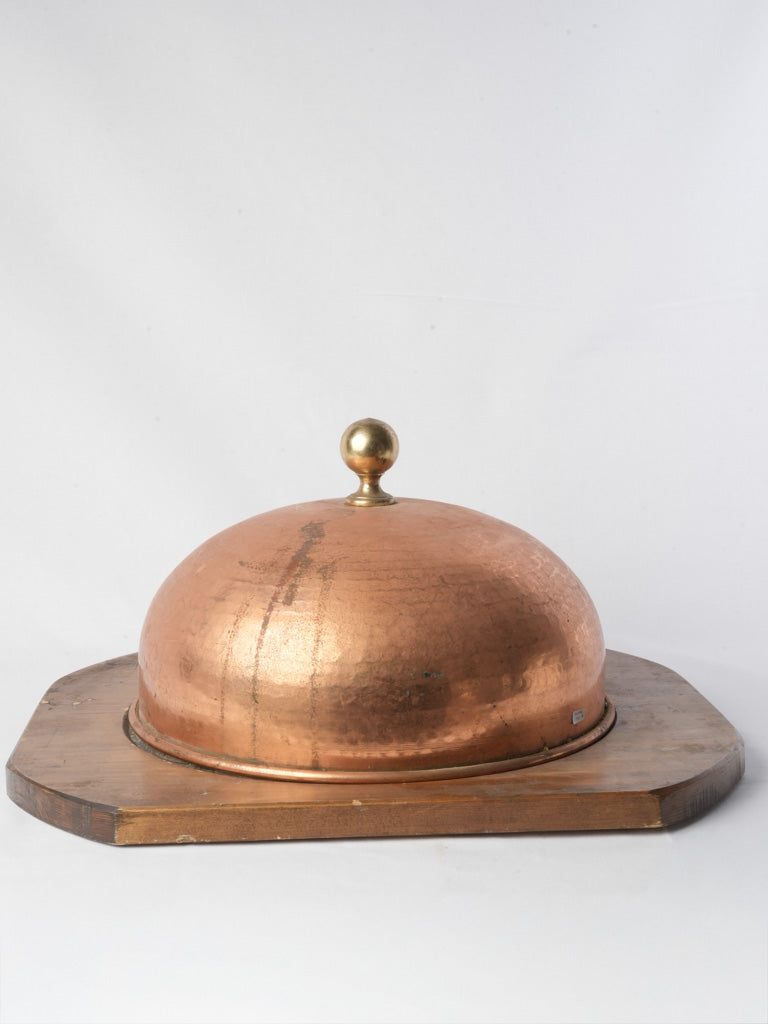 Mellow toned martelé copper dome  