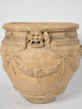 Grotesque-embellished Tuscan terracotta urn