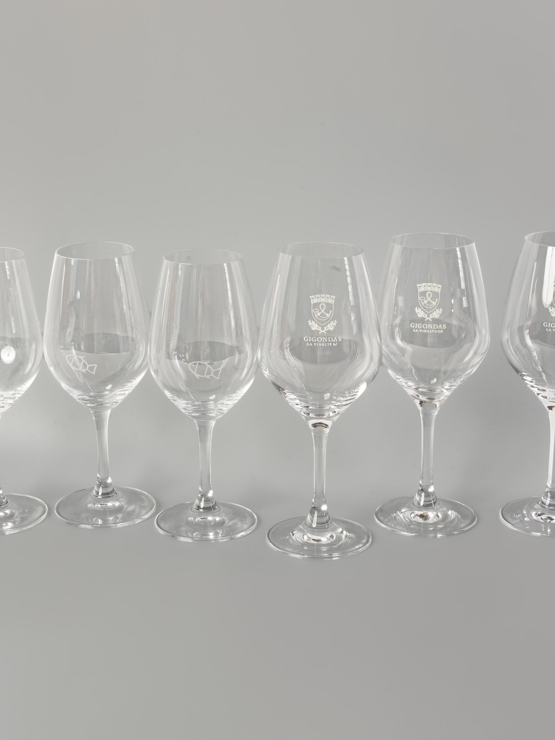 Six wine glasses from French wineries