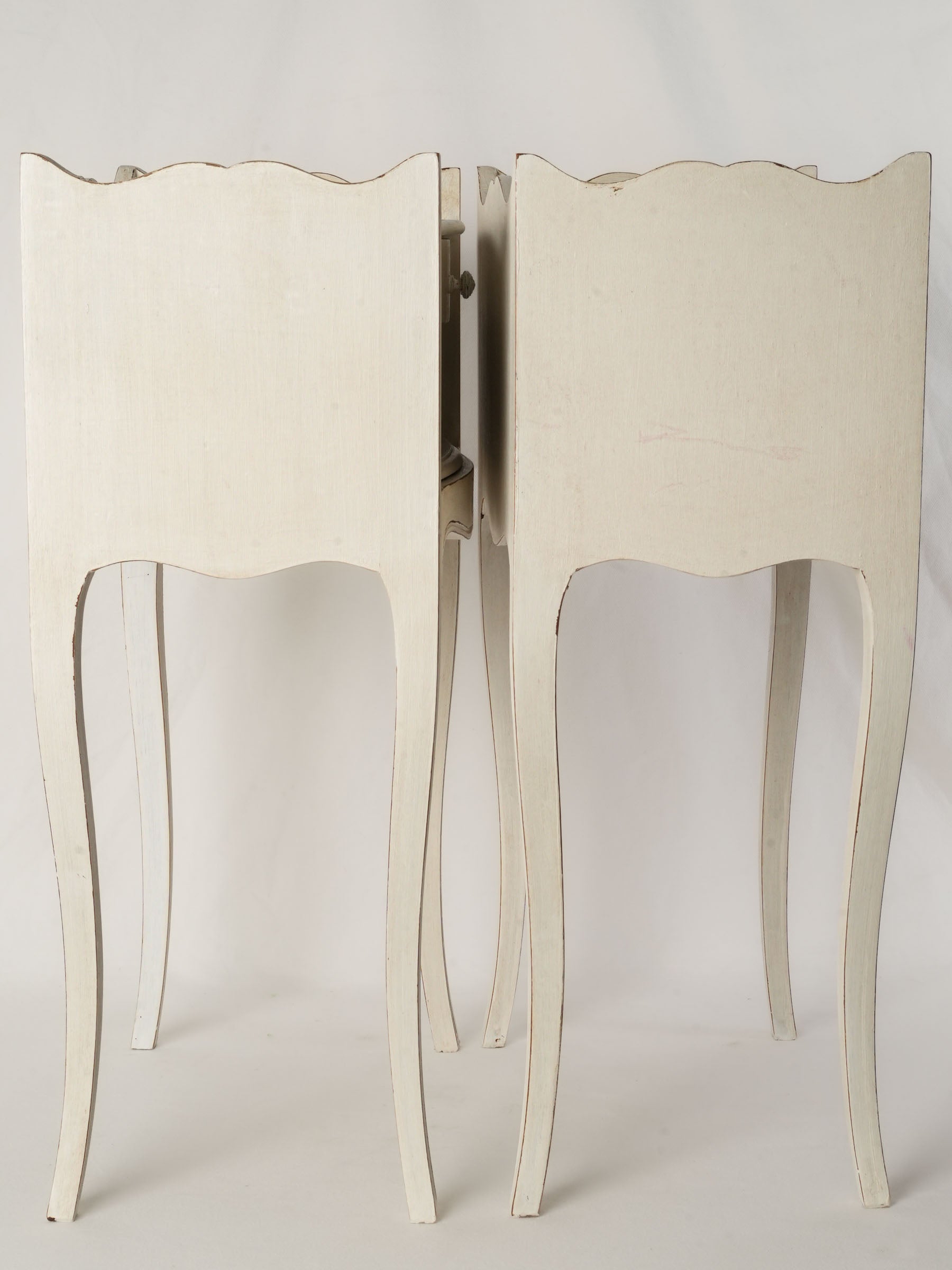 Subtle scalloped top edge tables  