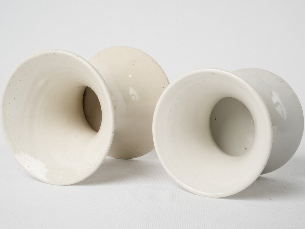 Timeless vintage white earthenware vases 