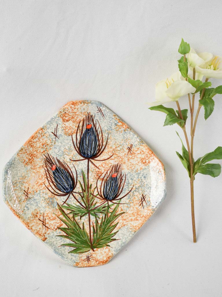 Vintage ceramic plate with thistles