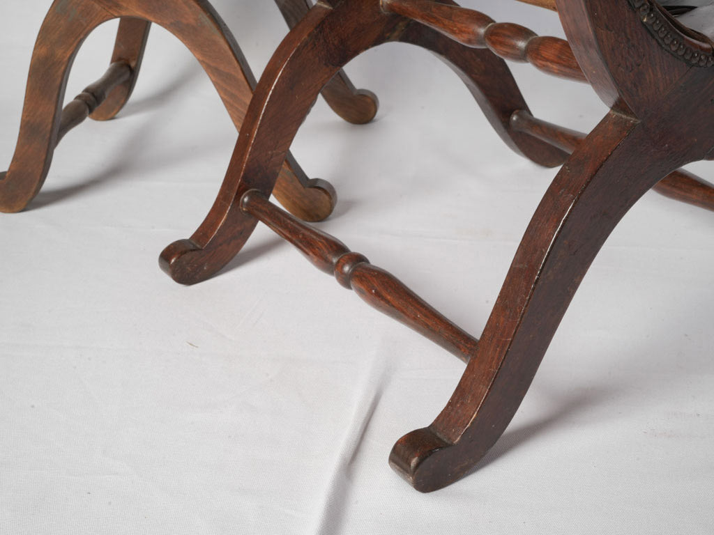 Antique style woven leather ottomans  