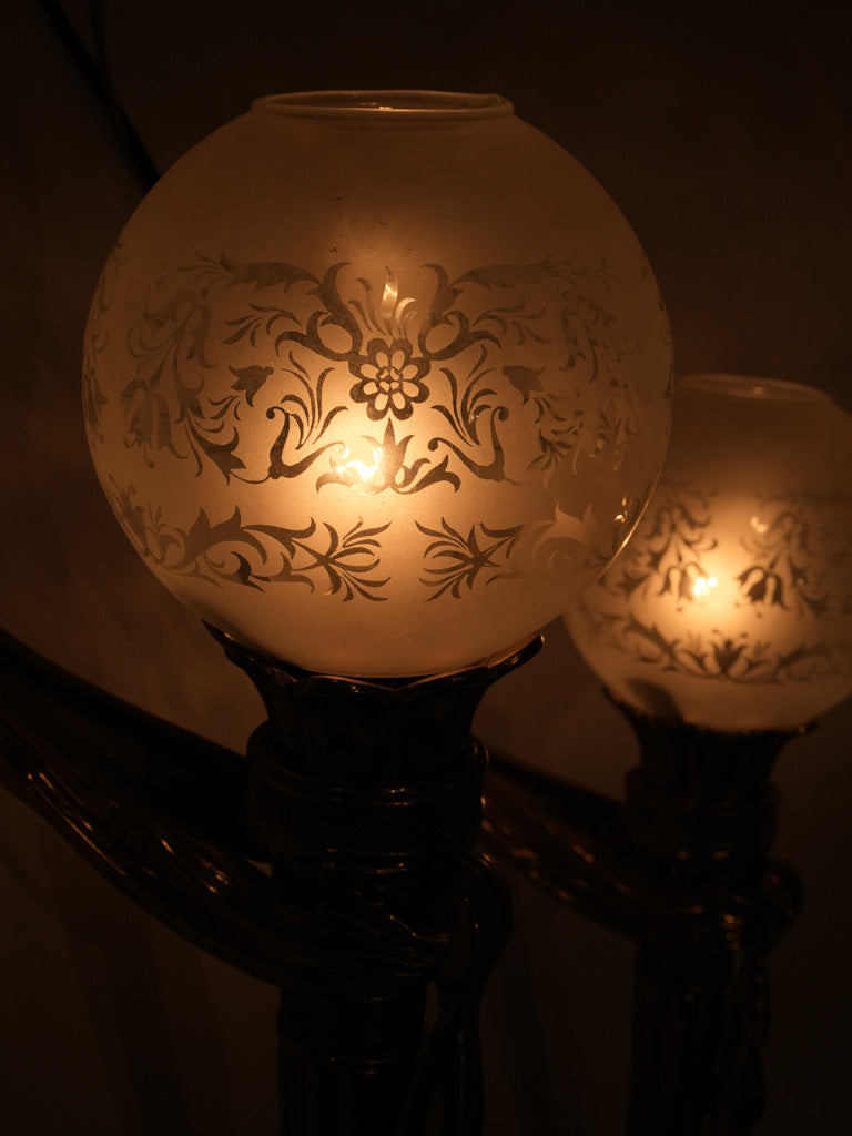 Charming frosted glass globe sconces