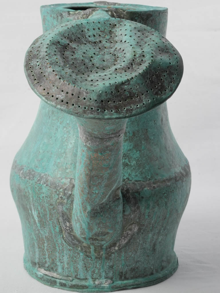 Elegant bulbous copper gardening vessel  
