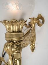 Regal gilt bronze fluted torch sconces