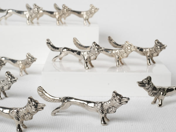 Detailed antique silver plate wolves