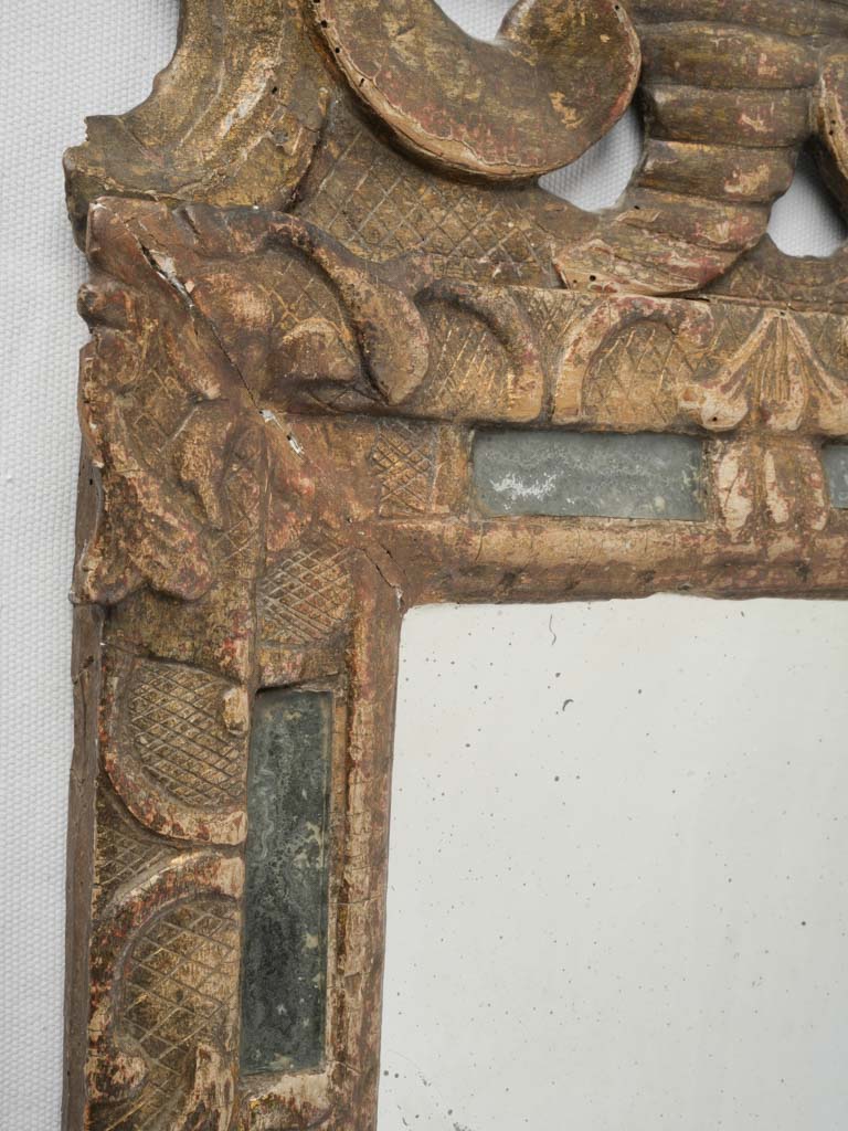 Richly patina gilded mirror