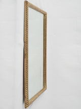 Antique, ribbed, gilded mercury mirror