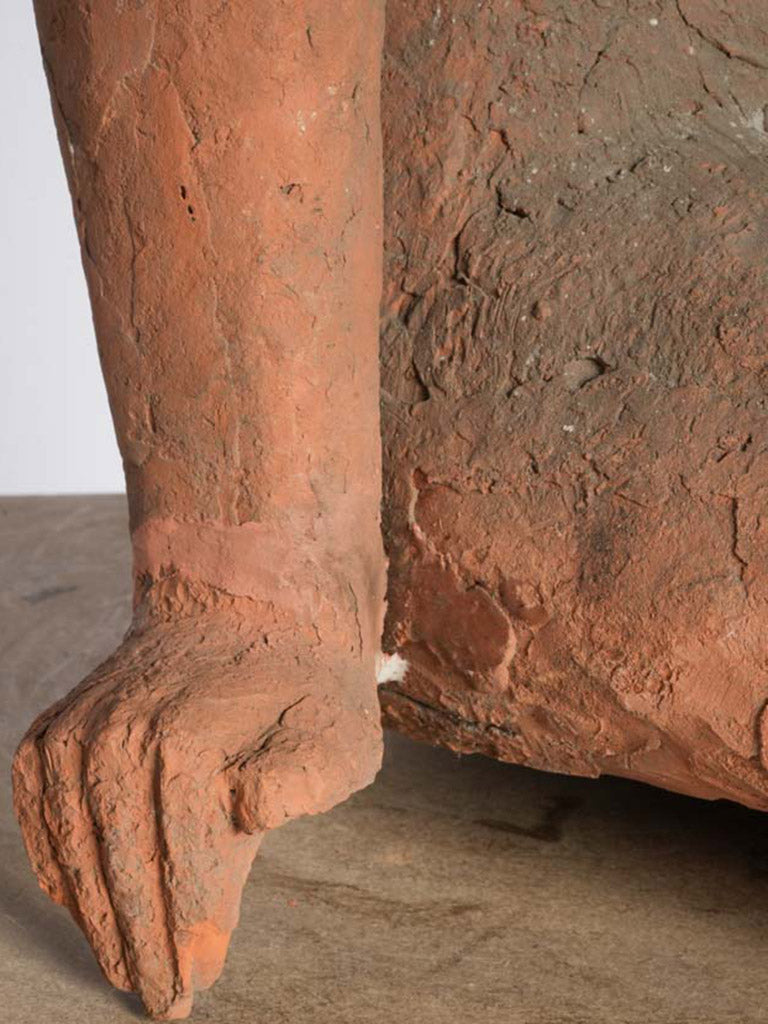 Age-worn umber finish ornament  
