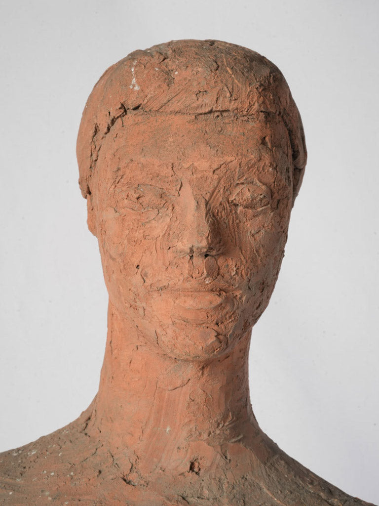 Calm and grounded terracotta sculpture  