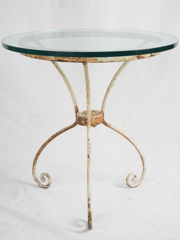 Stylish antique iron and glass table