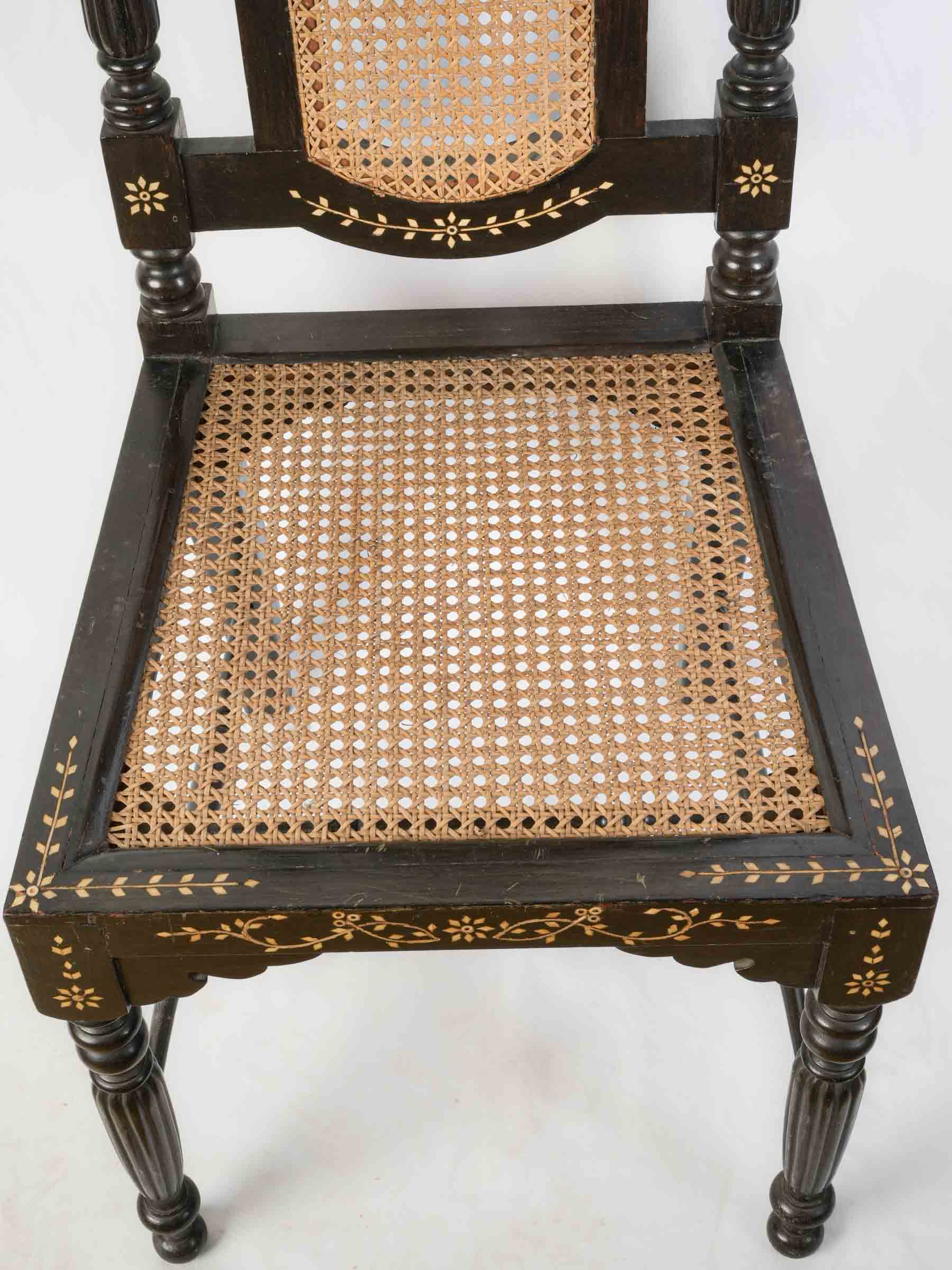 Set of Six Indo-Portuguese Ebonized Wood and Inlaid Cane Chairs, circa 1900